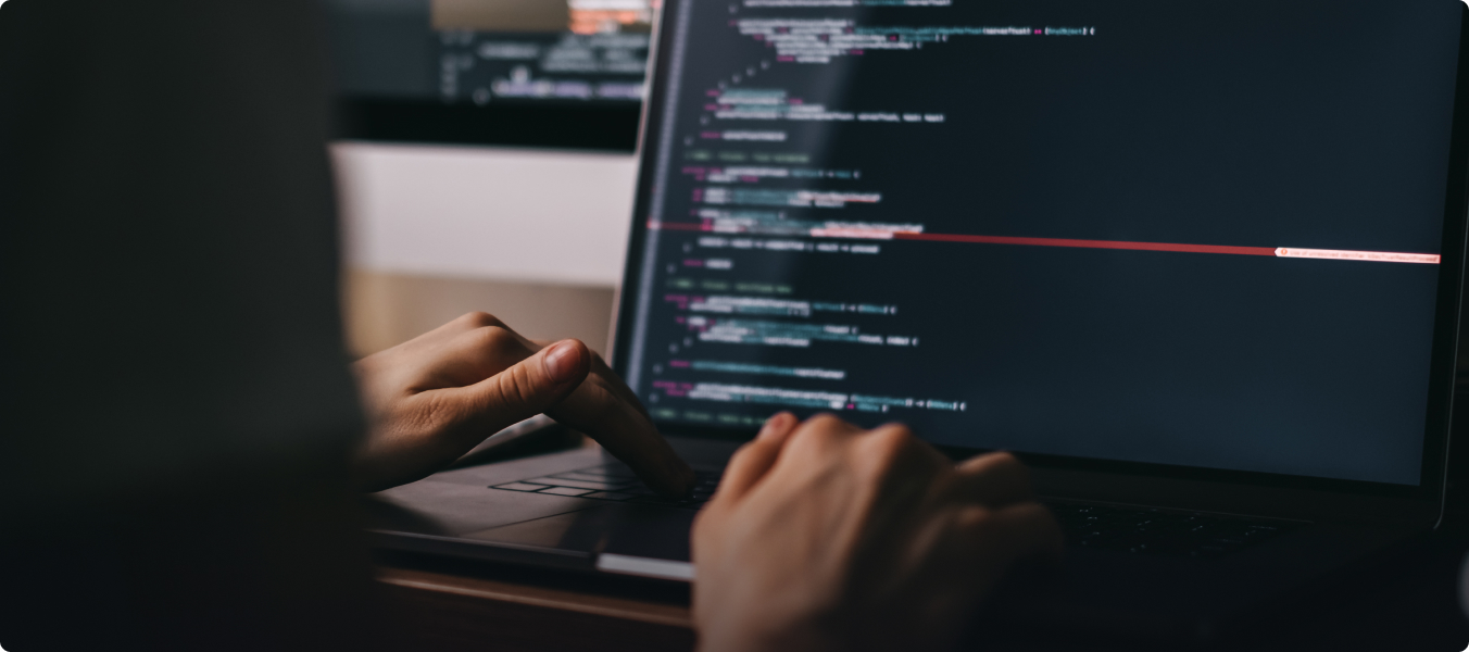 Web developer from our development agency writing lines of code